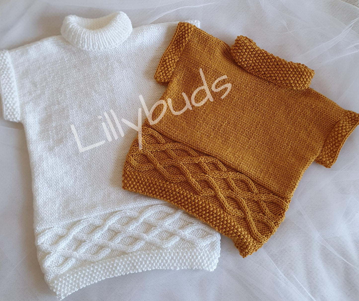 Delphine Aran Tabard Sweater 22"–26" Knitting Pattern