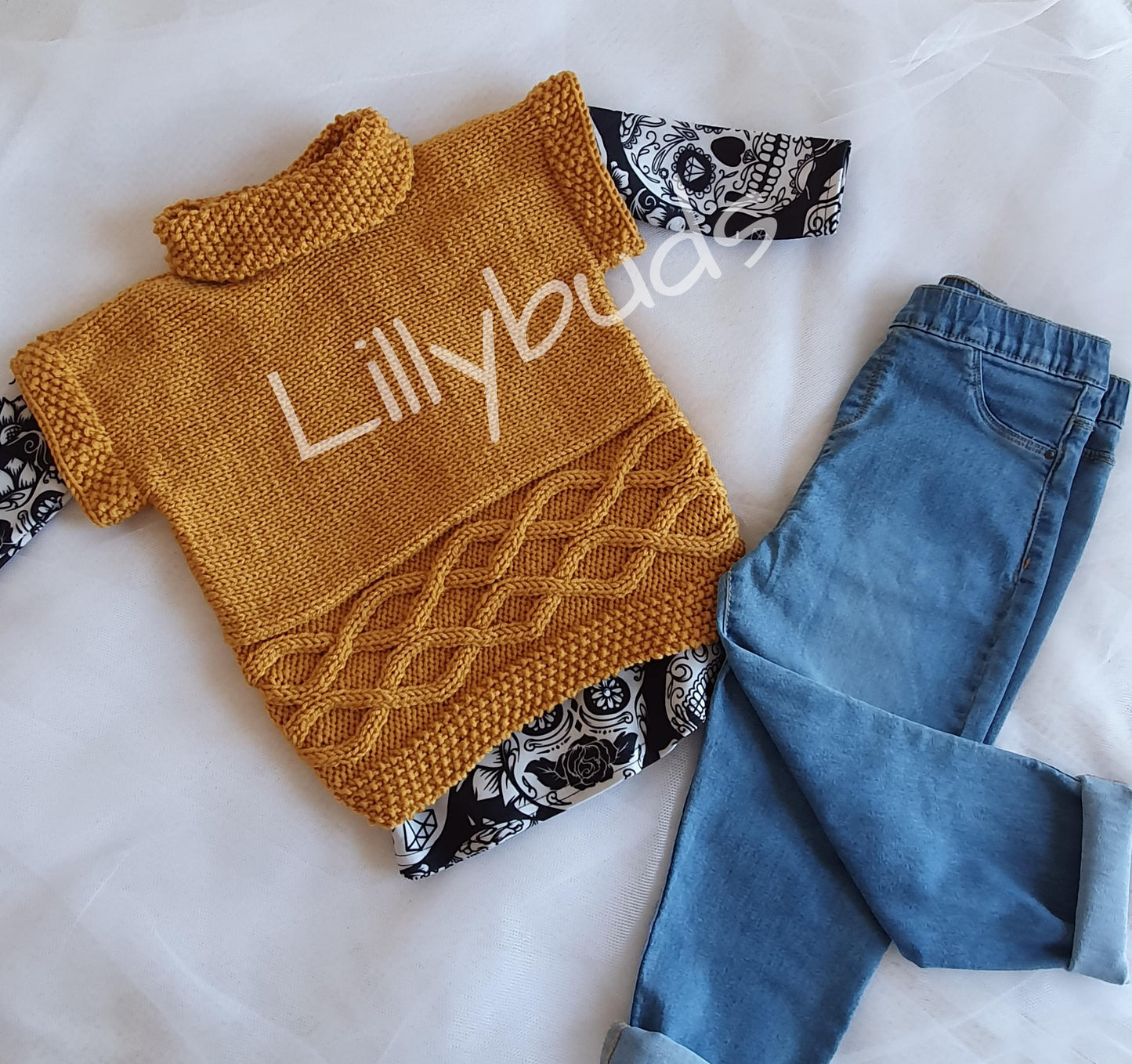 Delphine Aran Tabard Sweater 22"–26" Knitting Pattern